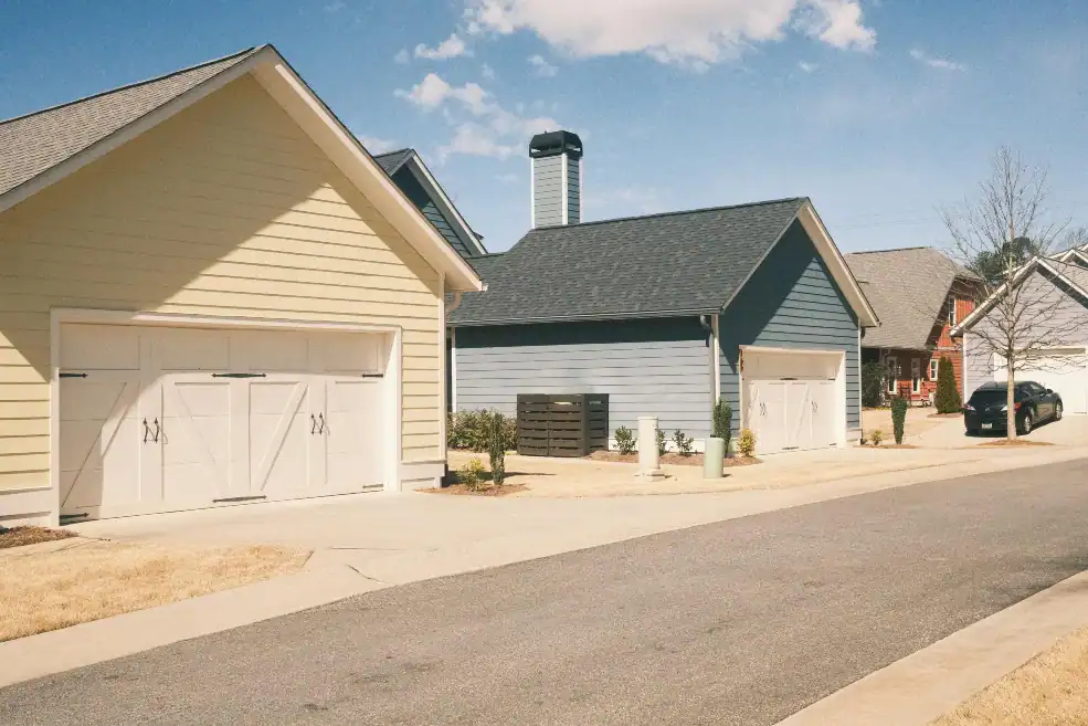 Residential garage doors along a suburban street