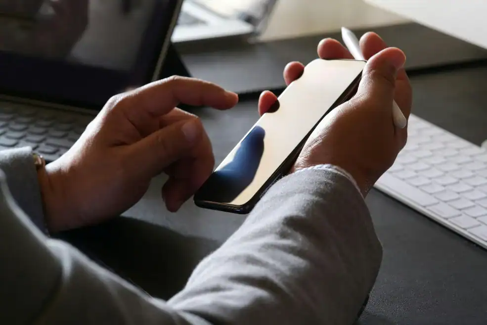 man holding smart phone