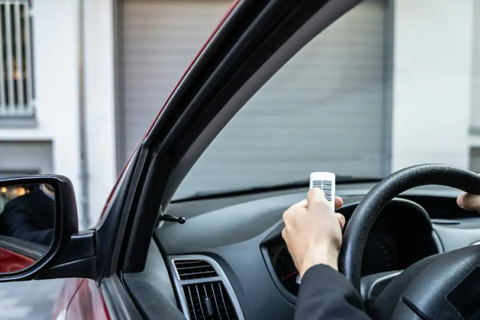 man's checking if garage door works.webp