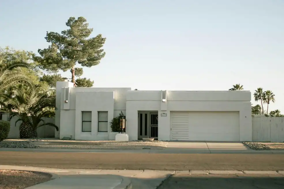 modern white house with steel garage door