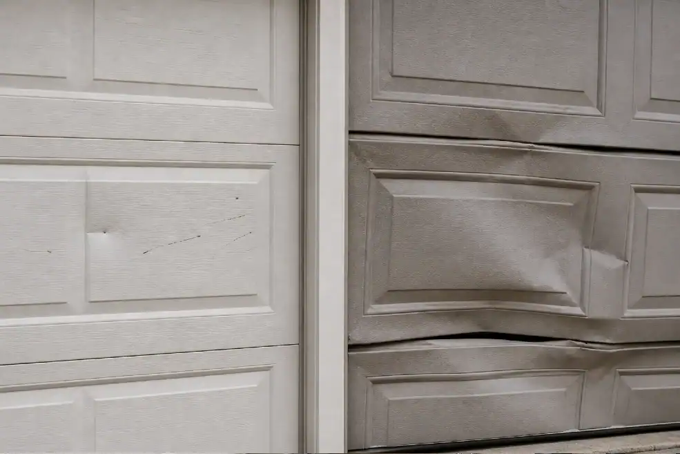 two damaged garage door panels