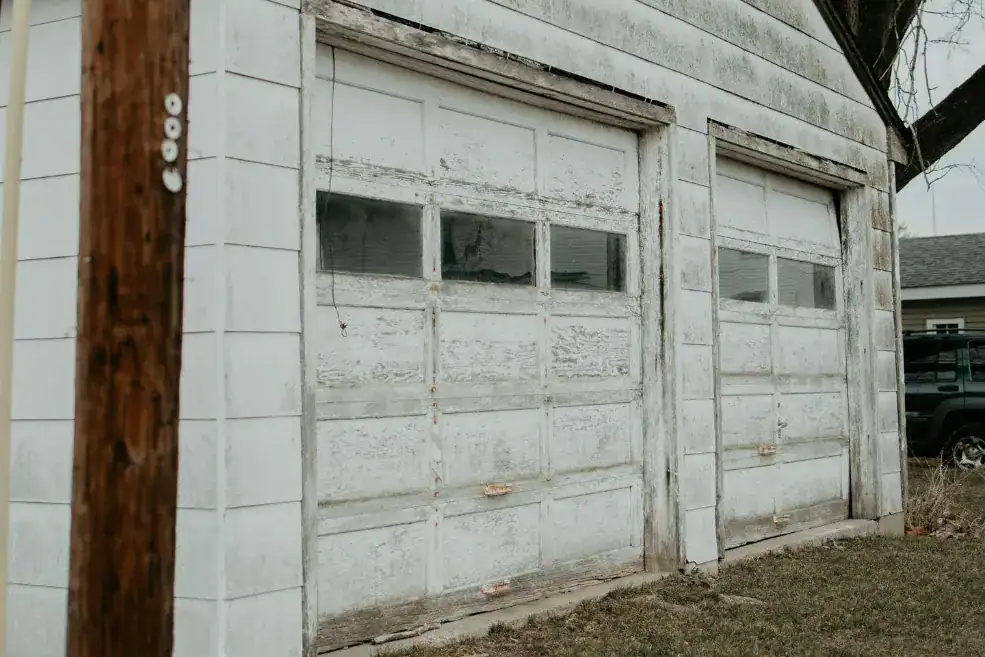 very old and damaged garage doors